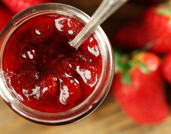 A jar of strawberry jam.