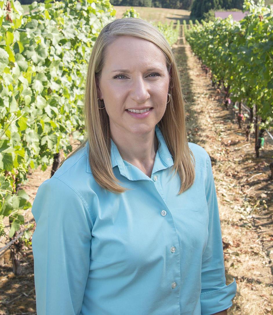 Patty Skinkis in vineyard