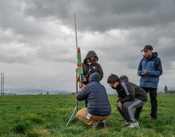 Members of the David Douglas High School Rocket Club, which is affiliated with OSU Extension 4-H, prepare to launch a rocket in Hillsboro.