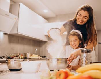 Woman and child cooking together