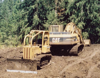 Most excavated woodland ponds will be completed with an excavator and a bulldozer working in tandem; the excavator removes the soil and the bulldozer shapes and compacts it.
