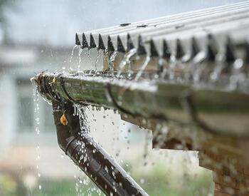 rainwater collecting off metal roof